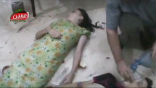 Image of Images of the dead were broadcast around the world. So far, the world is doing nothing in response. 