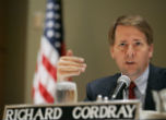Image of Richard Cordray CFPB Director is yet to explain why his agency is monitoring your credit card transactions. 