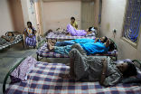 Image of Mothers in a surrogate house. Critics say the system exploits poor women. 