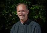 Image of Fr. Steve Peterson came to serve God after an epic adventure that included breathtaking experiences and genuine danger. 