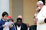 Image of Pope Francis meets children of Rome's Sacred Heart of Jesus at the Praetorian Barracks parish, Jan. 19, 2014. Credit: Lauren Cater/CNA.