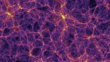 Image of The structure of the universe in a computer model. The bright spots are galaxies and the purple filaments are made of dark matter. 