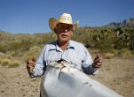 Image of Cliven Bundy is under siege on his cattle ranch by a small army of federal agents, over a tortoise and unpaid grazing fees. 