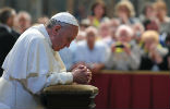 Image of Pope Francis prays during a general audience in this file photo.
