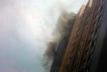 Image of Two firemen fell to their deaths, hand-in-hand while fighting a 13th story apartment fire. 