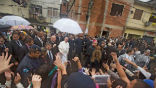 Image of Pope Francis visits a slum during his visit to Brazil. 