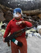 Image of A child soldier in Syria smokes a cigarette during a lull in fighting. 