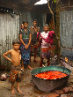 Image of A Bangladesh man handling toxic material without any protective equipment.
