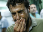 Image of A man breaks down in tears. Millions of men across the Middle East, from Israel and Palestine, to Syria and Iraq, know nothing but sorrow as conflict rages across the region, consuming their children. 