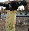 Image of A crucifixion in the Islamic State.
