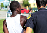 Image of A would be burglar caught by police.