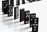 Image of Domino Effect:  a situation in which one event causes a series of similar events to happen one after another.