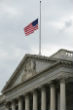 Image of The White House lowers its flags to commemorate the Chattanooga shooting victims.