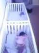 Image of Both girls lie prone in attempt to fool their mother.