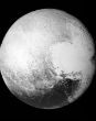 Image of New images of Pluto give scientists puzzling clues.