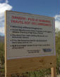Image of Signs warn Americans that U.S. authorities have no control in the region, which has likely been rented to the cartels. 