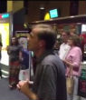 Image of A group gathers to join in the worship at North Carolina's Concord Mills movie theater.