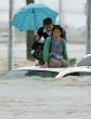 Image of People wait for helicopters to rescue them in the midst of Japan's flood.