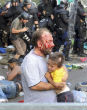 Image of Hungarian officials can now use non-lethal weapons against migrants trying to illegally cross borders.