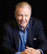 Image of Actor Jon Voight joins the choir at a Restoring Unity event and praised God.