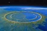 Image of An artist's depiction of the Chicxulub crater, which is the site of the impact that wiped out the dinosaurs. 