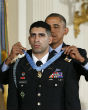 Image of United States military Captain Florent Groberg received the military's highest honor by President Barack Obama. (Pablo Martinez Monsivais).