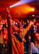 Image of College students worship God together  (Phil Sanders).