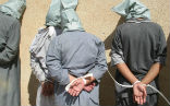 Image of ISIS prisoners await their fate after being captured. Some are being delivered to the Kurds, who allegedly torture them. 