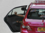 Image of A pair of men entered a taxi cab and began kissing, in front of the Muslim driver. 