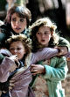 Image of An exorcist claims a demon continues to attack family members of all ages (Mama/Fandango).