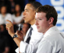 Image of Obama and Zuckerberg work closely. It's not clear on what. 