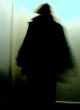 Image of Strange figures dressed in black have been appearing in several states (Meridith may/Prezi).