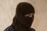 Image of ISIS turns to phone apps to sell women as sex slaves.