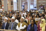 Image of Muslims gather at the cathedral where Fr. Jacquel Hamel was killed. Their presence is intended as a sign of unity against militant Islam. 