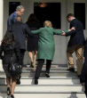 Image of Questions surround Hillary Clinton as she has seizures, stutters, freezes up, and needs help up stairs. 