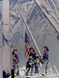 Image of The 9/11 flag is raised at Ground Zero. The iconic photo remains an enduring image of the aftermath of the disaster. 