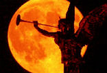 Image of The Bible says signs of the end times will be seen in the moon.