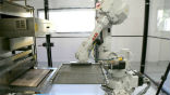 Image of Zume pizza is making pizza with robots. In the next few years, the fast food industry is expected to automate significantly. 