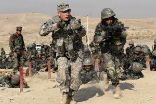Image of U.S. soldiers providing training to Afghani personnel. 