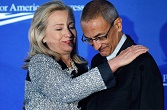 Image of Hillary Clinton (now the Democratic nominee) and John Podesta