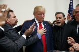 Image of Christian leaders pray for Donald Trump during his campaign.