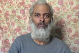 Image of Fr. Tom appears in the video, looking a bit older and more worn as a result of his captivity. 