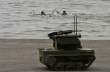 Image of The Russian terminator robot, shown here during an exercise, is designed for counter-terrorism operations. 
