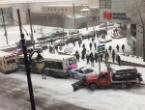 Image of Freezing conditions in Montreal caused two buses, a police car and a snowplow to pile up in a downtown intersection. 