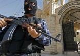 Image of ISIS terrorists take over a Christian church in Mosul.
