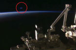 Image of City lights? A reflection? A rocket? What could it be? Perhaps... a UFO?