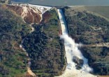 Image of Butte County's 900-foot tall Oroville Dam spillway is broken.