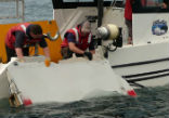 Image of Scientists testing the flaperon discovered it floats uniquely, changing the results of their tests. 