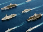 Image of President Trump has ordered multiple aircraft carriers to Korea. 