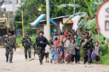 Image of The army has rescued hundreds of people, but 300-600 Christians still remain trapped in the city. 